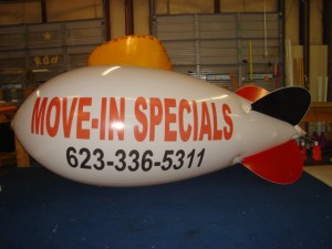 Move-in-specials-advertising-blimp advertising blimp with lettering