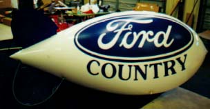 Advertising Blimp - 11ft. Ford Country logo. Hundreds of helium blimps in stock. We make blimps Your Way! We are the manufacturer.