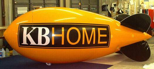 Advertising Blimp w/KB Home logo. 14ft. blimps w/o artwork are $665.00 and are our best selling blimps. 14ft. blimps with artwork from $1021.00. We have hundreds of advertising balloons in stock.