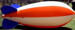 Big Advertising Blimp - 14ft. RWB stripes. $665.00 and flys better than a 20ft. pvc blimp plus it uses less than half the helium for better performance.