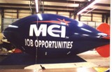 Blimp 30ft. - MCI logo - Balloons made in USA.